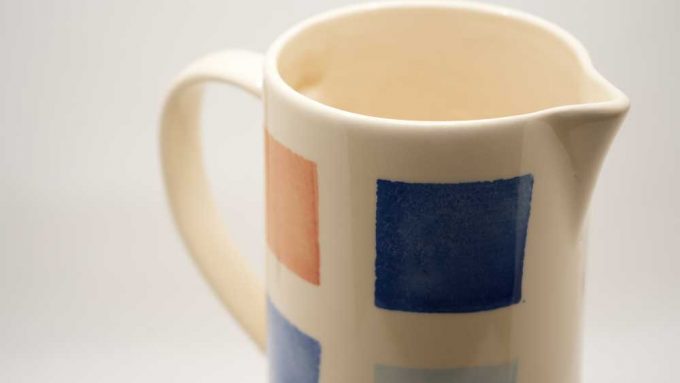 EuroSecla jug. A tall jug with 6 handpainted squares in blue and orange.