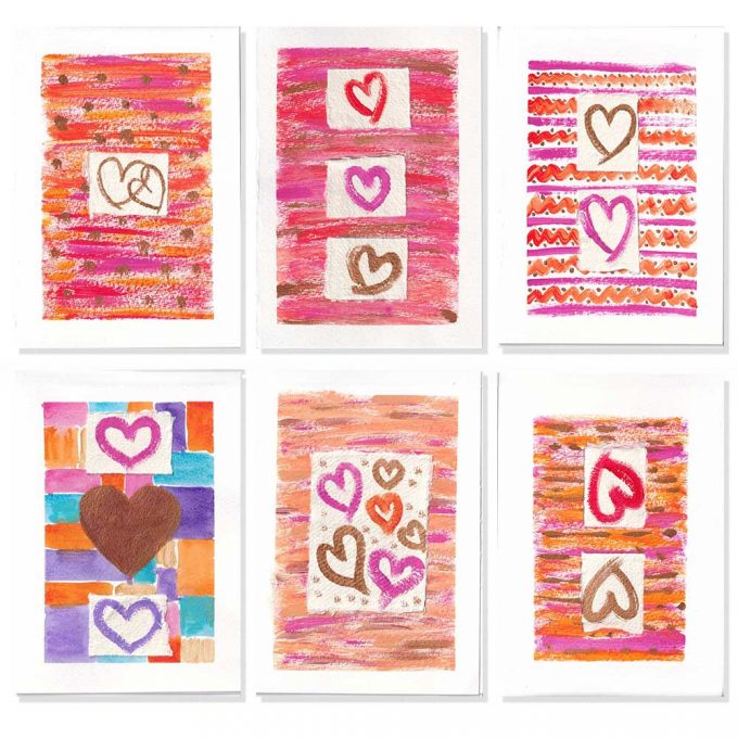 pink and purple stripes behind love hearts by the herringbone studio