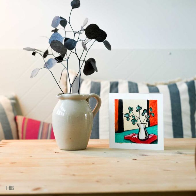 A handpainted art greeting card with a vase of flowers